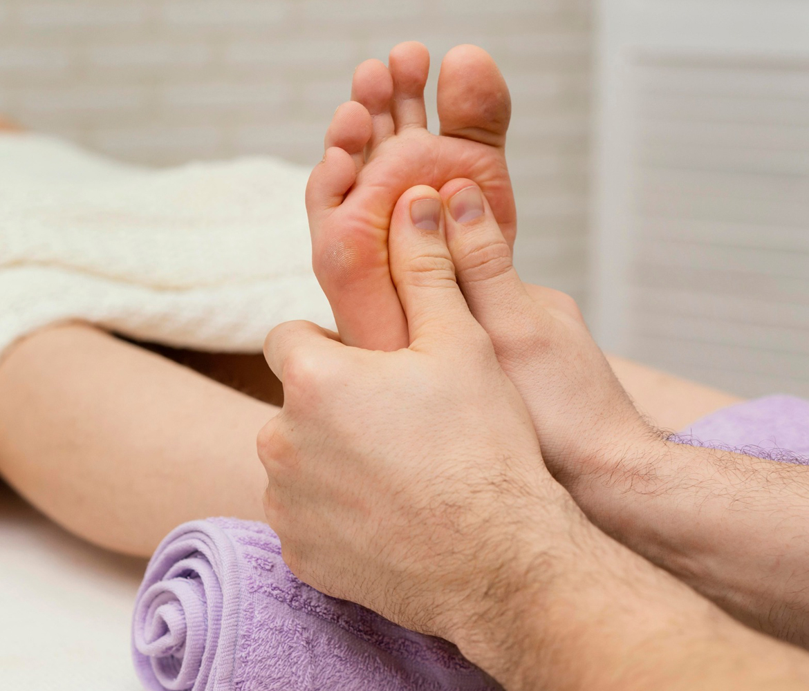 Foot reflexology session at Restore Mobility Physio & Wellness
